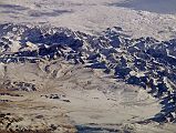 Shishapangma 02 04 Nasa ISS008-E-13316 Low Angle From East Nasa ISS008-E-13316 was taken on 2004-01-28 from the east. This is a superb lower angle image of Shishapangma and the surrounding mountains, with Peiku Tso in the lower right. Shishapangma is the mountain with what looks like a dark triangular rock face vertically in the centre and horizontally just to the left of centre, with Phola Ganchen (7661m) on the ridge to the left.